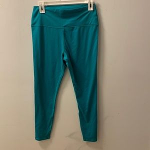 Never worn, high waisted, turquoise leggings